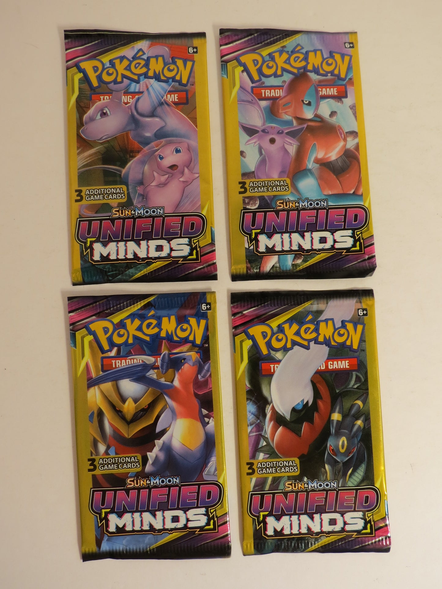4x Sun & Moon Unified Minds 3 Card Booster Pack Art Set Pokemon Sealed